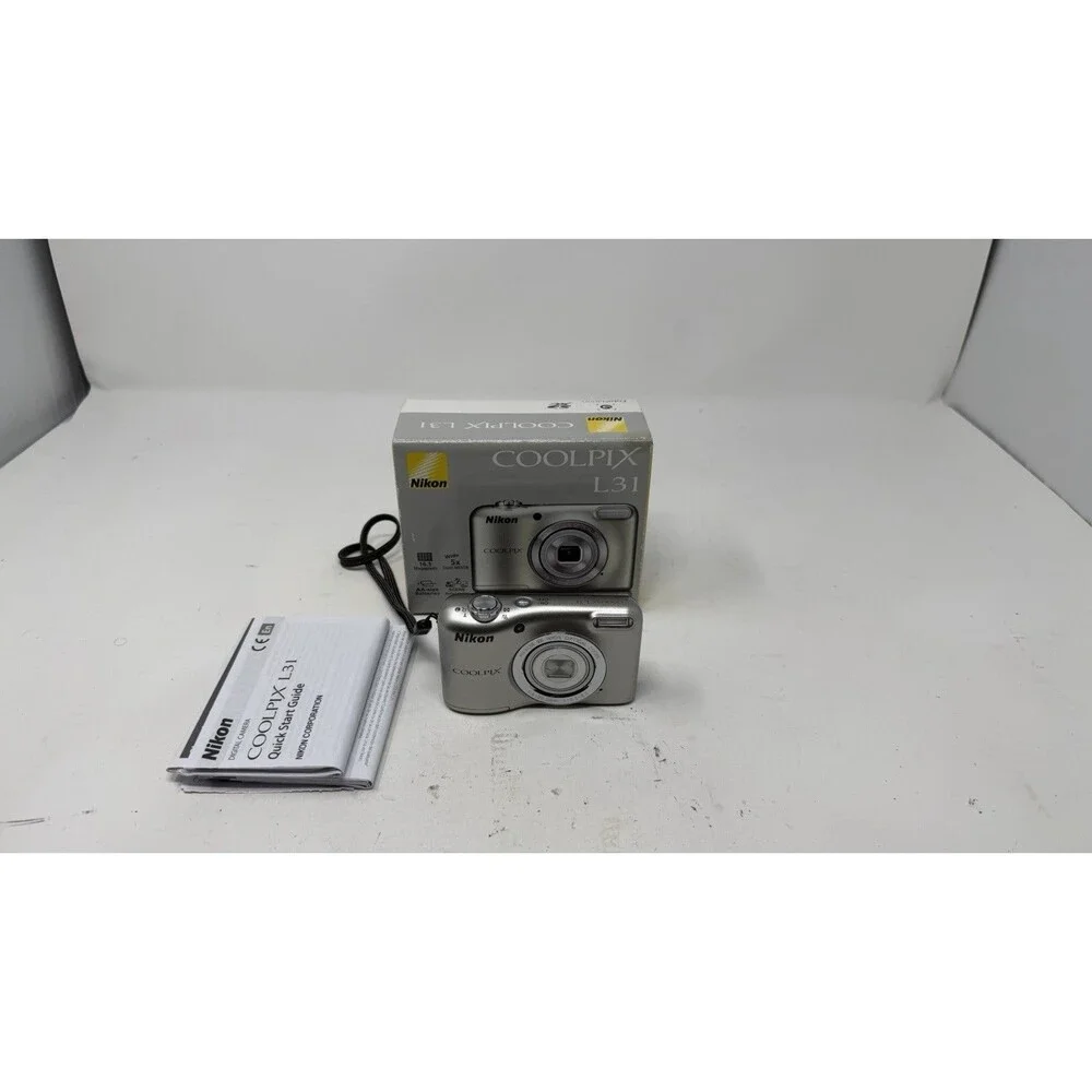 Nikon COOLPIX L31 16.1MP 5x Optical Zoom Silver Digital Camera W/ Box Works